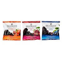 three bags of berries on a white background