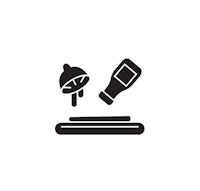 a black icon of a bottle and a spoon on a white background
