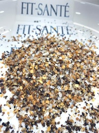 a white plate with salt and pepper on it