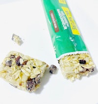 a piece of granola bar on a white plate
