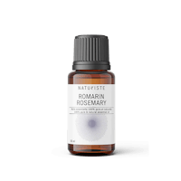 a bottle of common rosemary essential oil on a black background