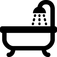 a black and white icon of a bathtub