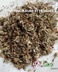 a plate of dried herbs with the words abreine fleurs femelles